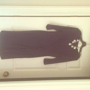 Navy blue party dress with jeweled necklace